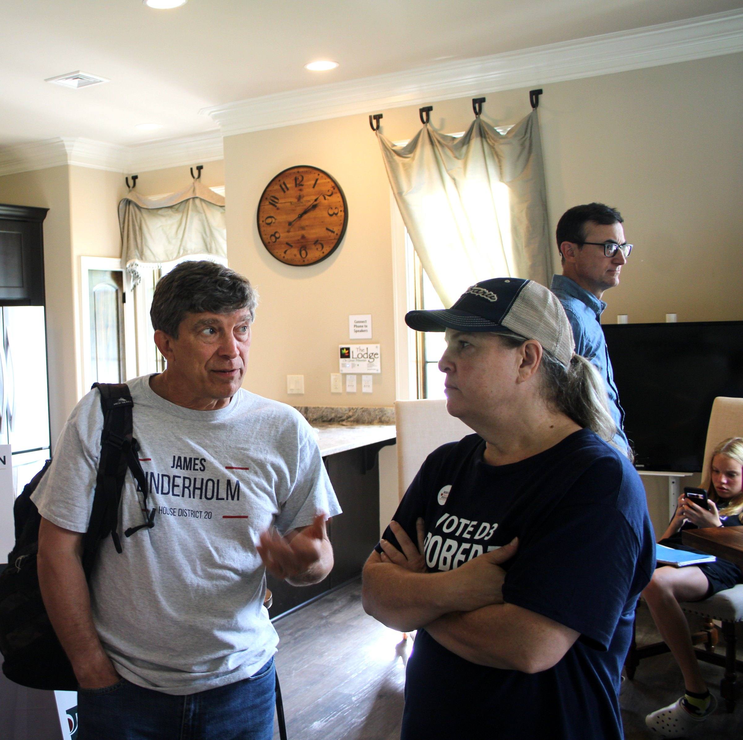 James Linderholm talking with two supporters at a campaign event